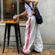 Fulfillment 2025 new European spring summer color block straight personality stripe patching wide-legged loose comfortable women's pants for wholesale