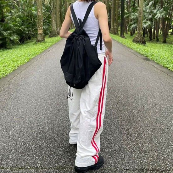 Fulfillment 2025 new European spring summer color block straight personality stripe patching wide-legged loose comfortable women's pants for wholesale